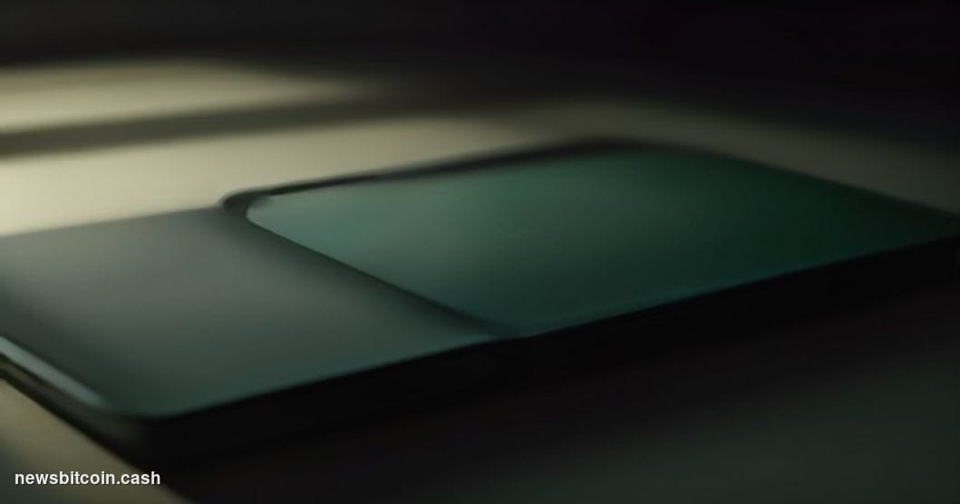 Cinematic photorealistic editorial photograph of a Bitkey hardware wallet device resting on a dark matte desk surface, dramat